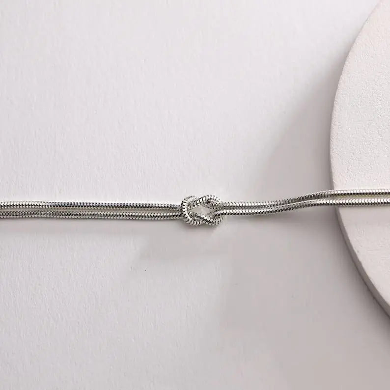 Twist Armband Eleganter Herz-Knoten